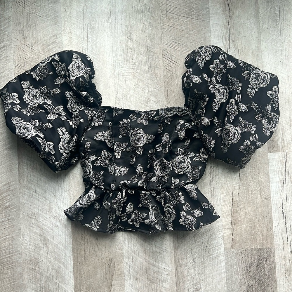 VICI Strut and Bolt Black and Silver Rose Detail. Puff Sleeve Peplum Top